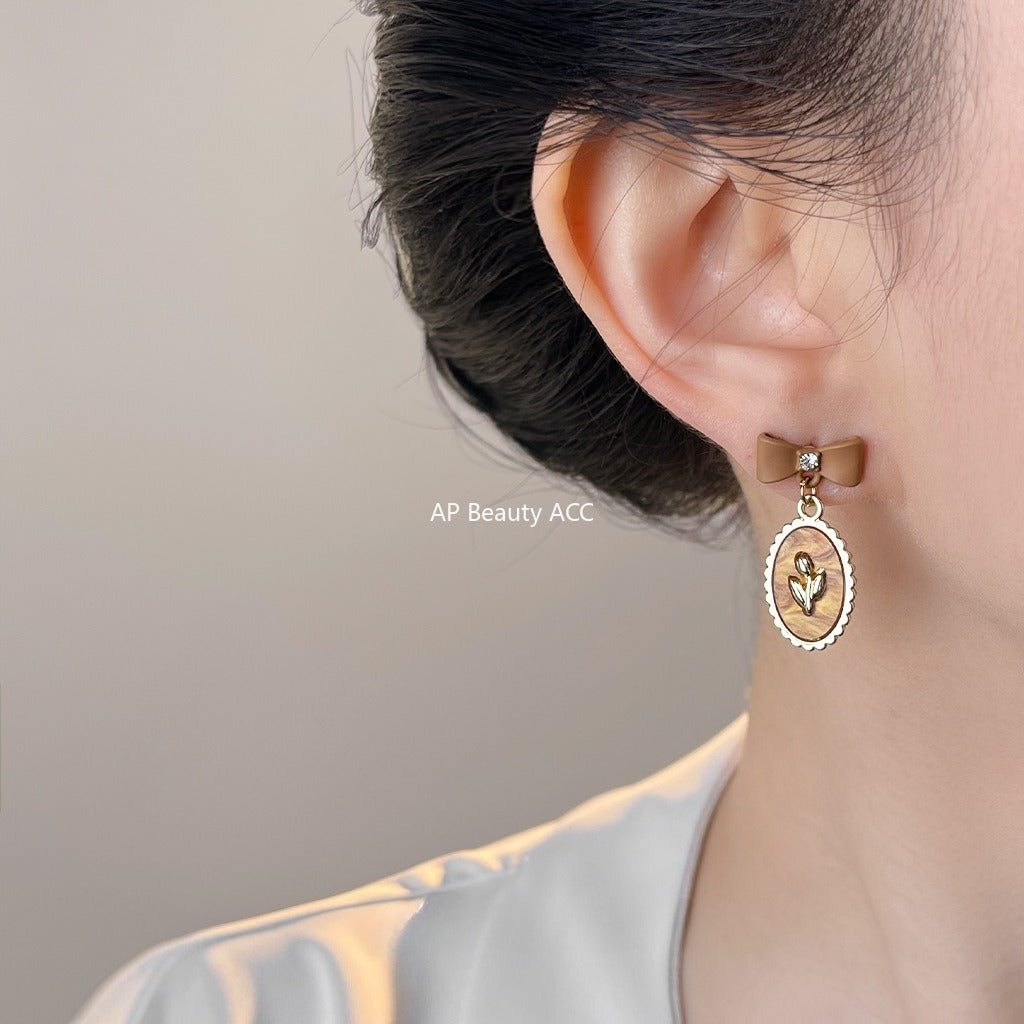 C관 - 925 은침 브라운 에나멜 리본 큐빅 귀걸이 [7024] 25.11-1