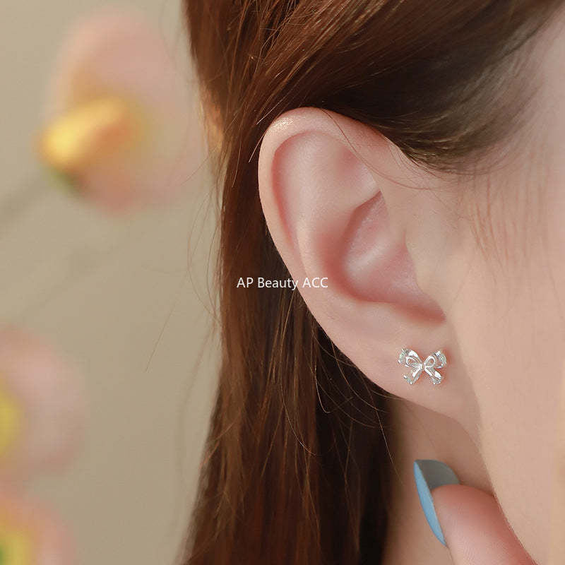 B관 - 925 실버 리본 모양 큐빅 귀걸이 [YC4264E_1] 25.09-4
