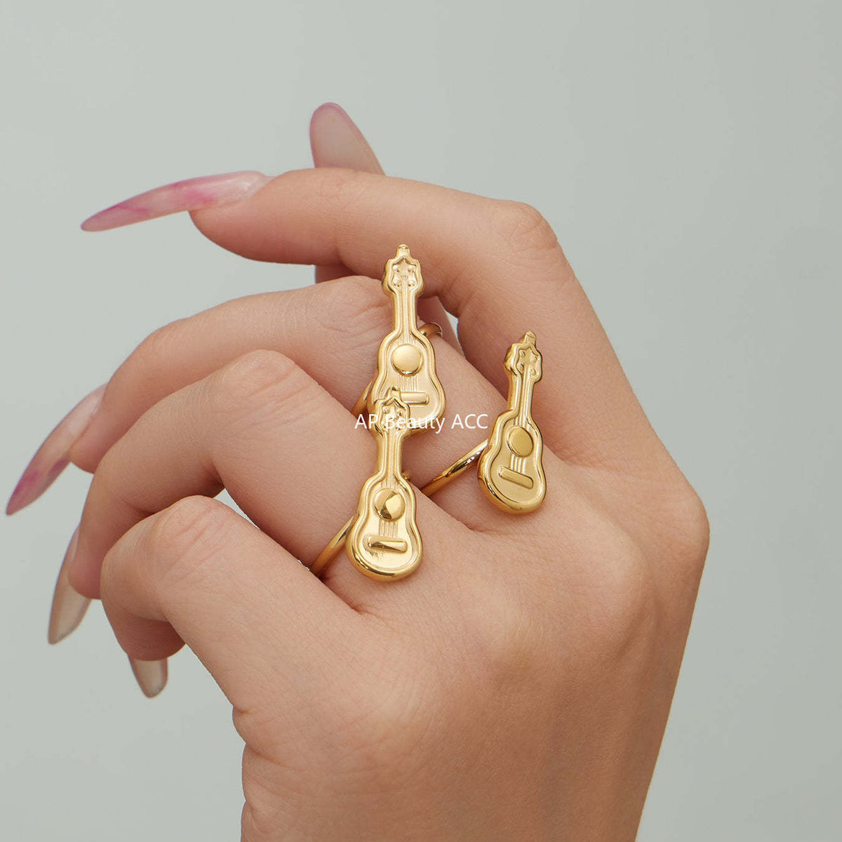 D관 - 스테인리스 스틸 18K 도금 미니 기타 오픈형 반지 [A542] 25.12-3