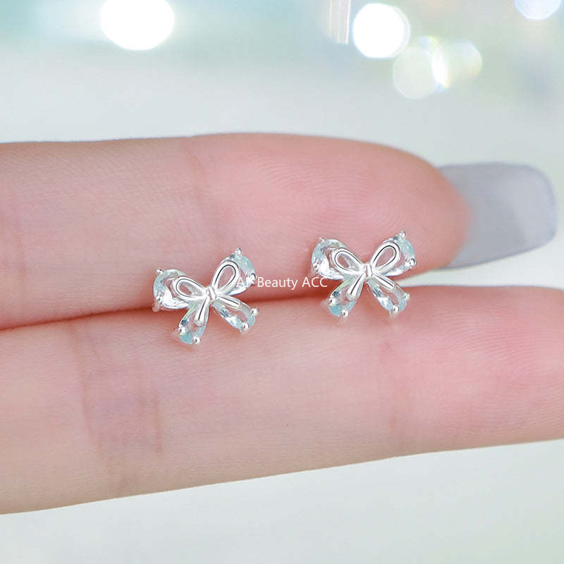 B관 - 925 실버 리본 모양 큐빅 귀걸이 [YC4264E_1] 25.09-4