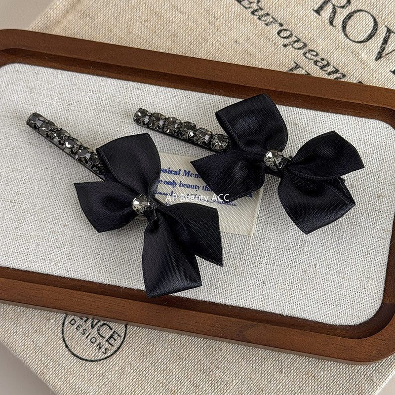 E관 - 리본 디자인 큐빅 장식 헤어핀 [26037E] 25.11-2