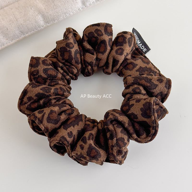 E관 - 스웨이드 호피 패턴 곱창 헤어밴드 [27656] 25.11-2