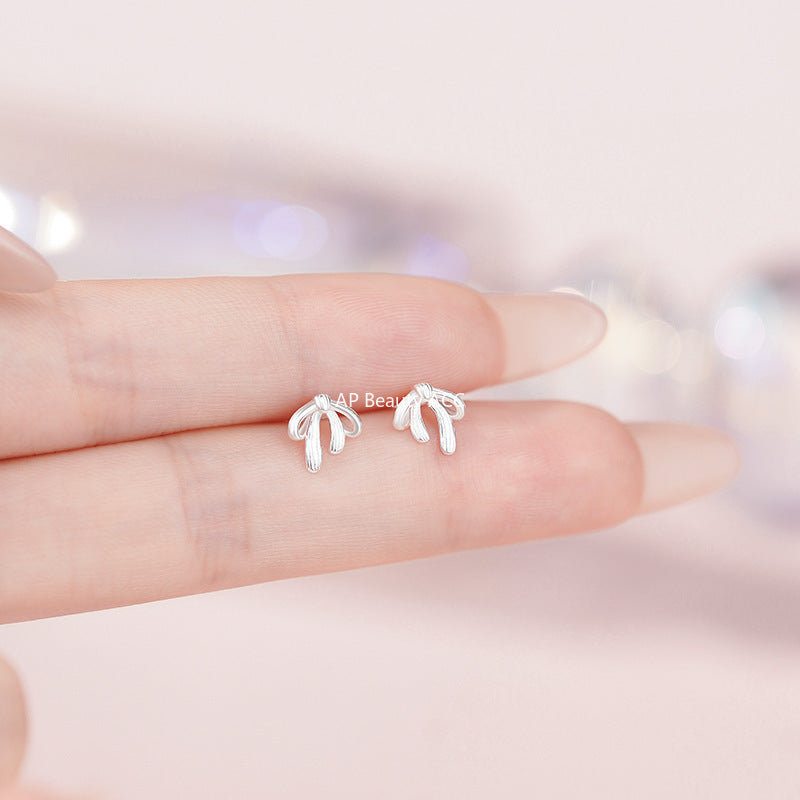 B관 - 999 실버 리본 매듭 피어싱 귀걸이 [YC7265E_1] 25.11-1