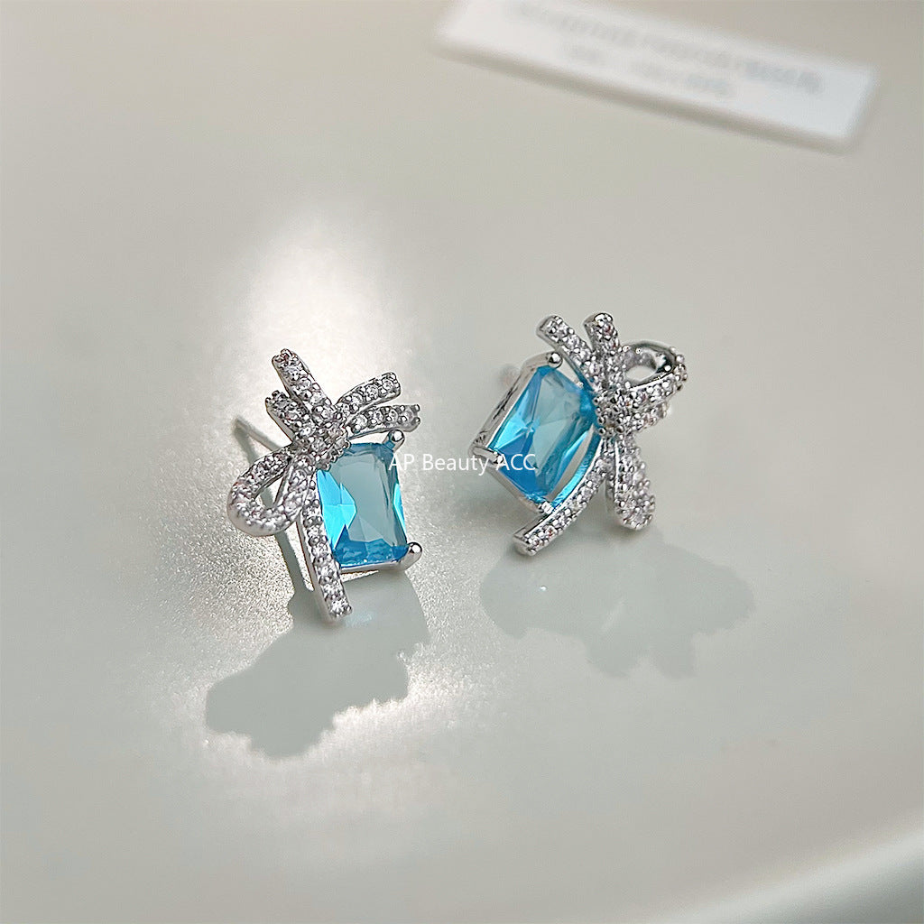 C관 - 아쿠아마린 컬러 큐빅 리본 925 은침 귀걸이 [5767] 25.04-1