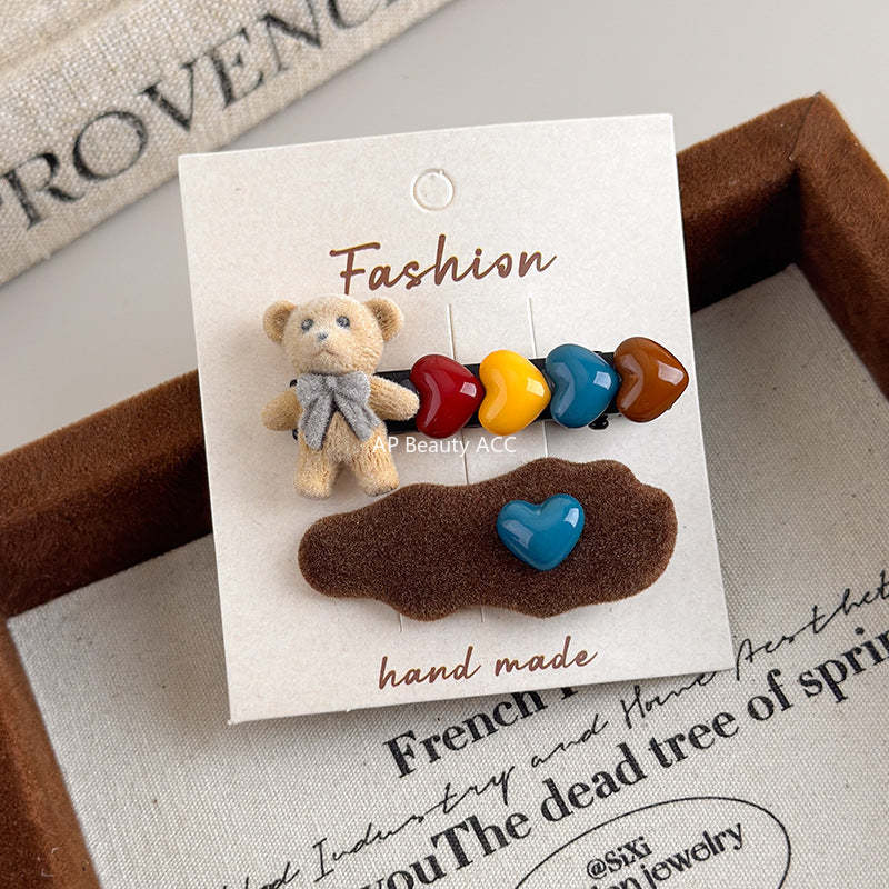 E관 - 벨벳 곰 하트 장식 사이드 앞머리 헤어핀 [27596] 25.10-4