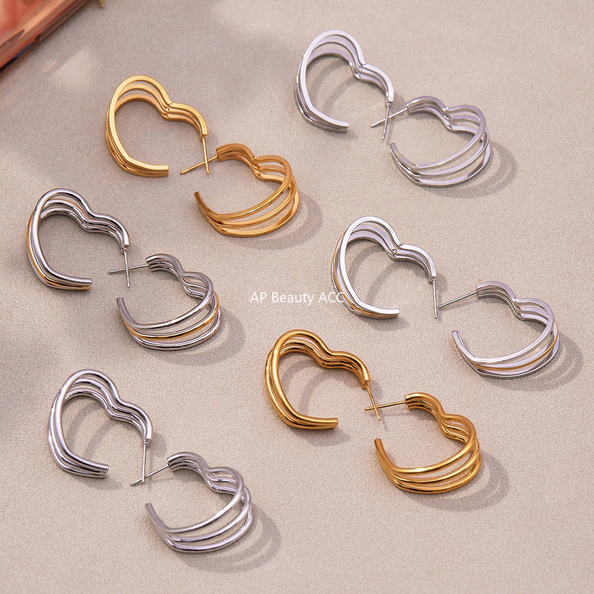 D관 - 스테인리스 18K 도금 레이어 하트 트위스트 귀걸이 [F753] 25.11-1