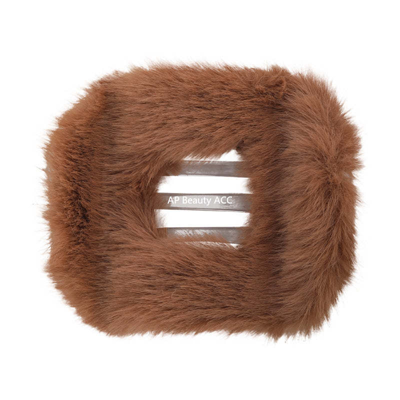 E관 - 퍼 소재 타원형 호피무늬 대형 집게핀 [26154] 25.11-1