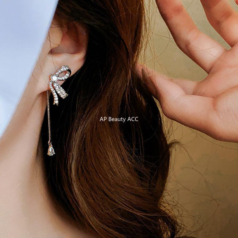 C관 - 실버 큐빅 리본 태슬 디자인 유니크 엘레강스 귀걸이 [E18935] 24.03-1