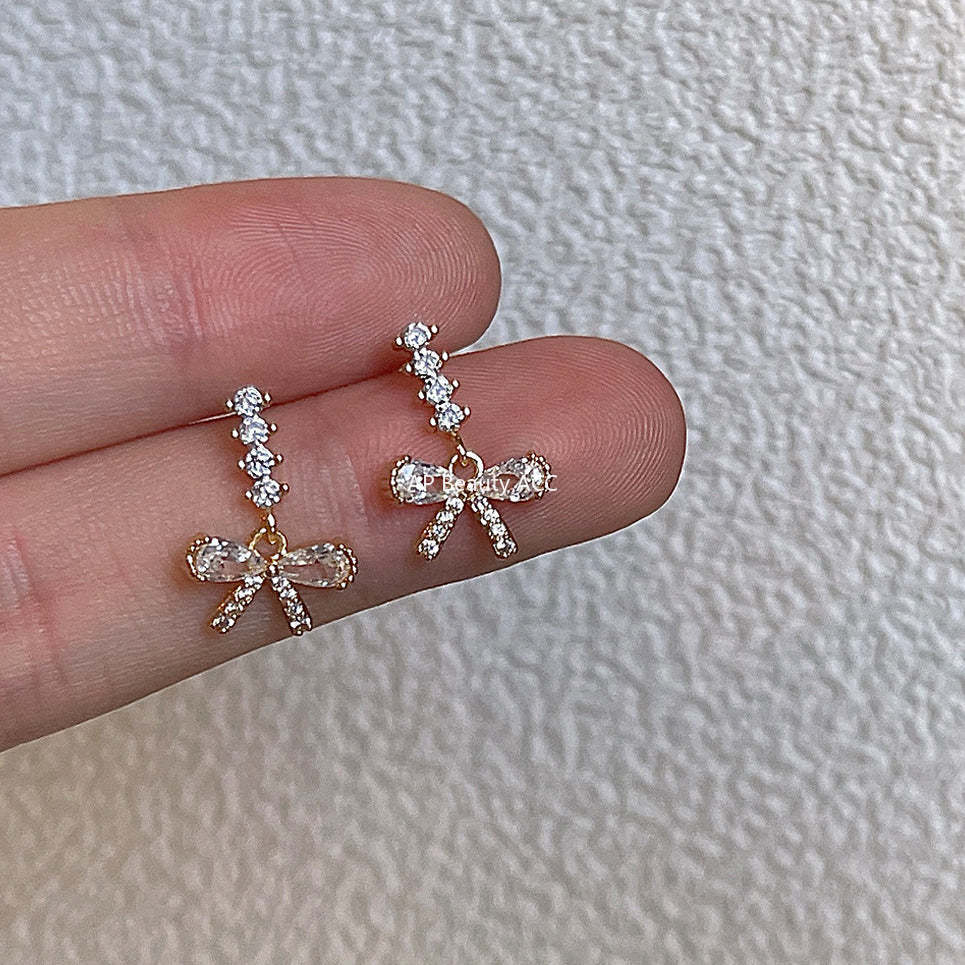 C관 - 고급스러운 큐빅 리본 귀걸이 [1399] 24.05-2