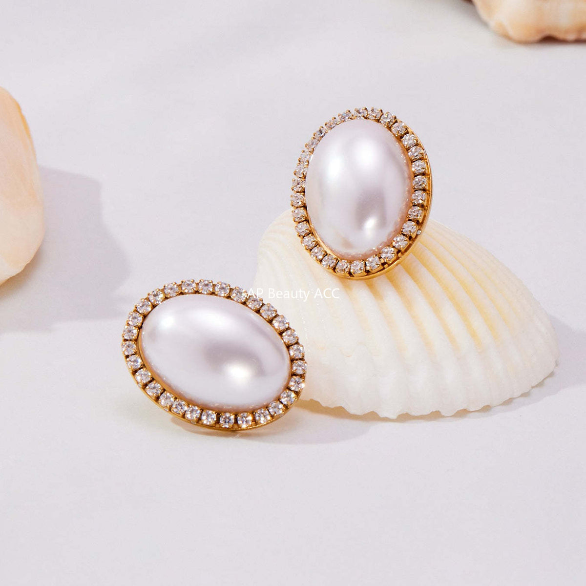 D관 - 스테인리스 18K 도금 타원형 자개진주 큐빅 귀걸이 [F793-F983] 25.10-5