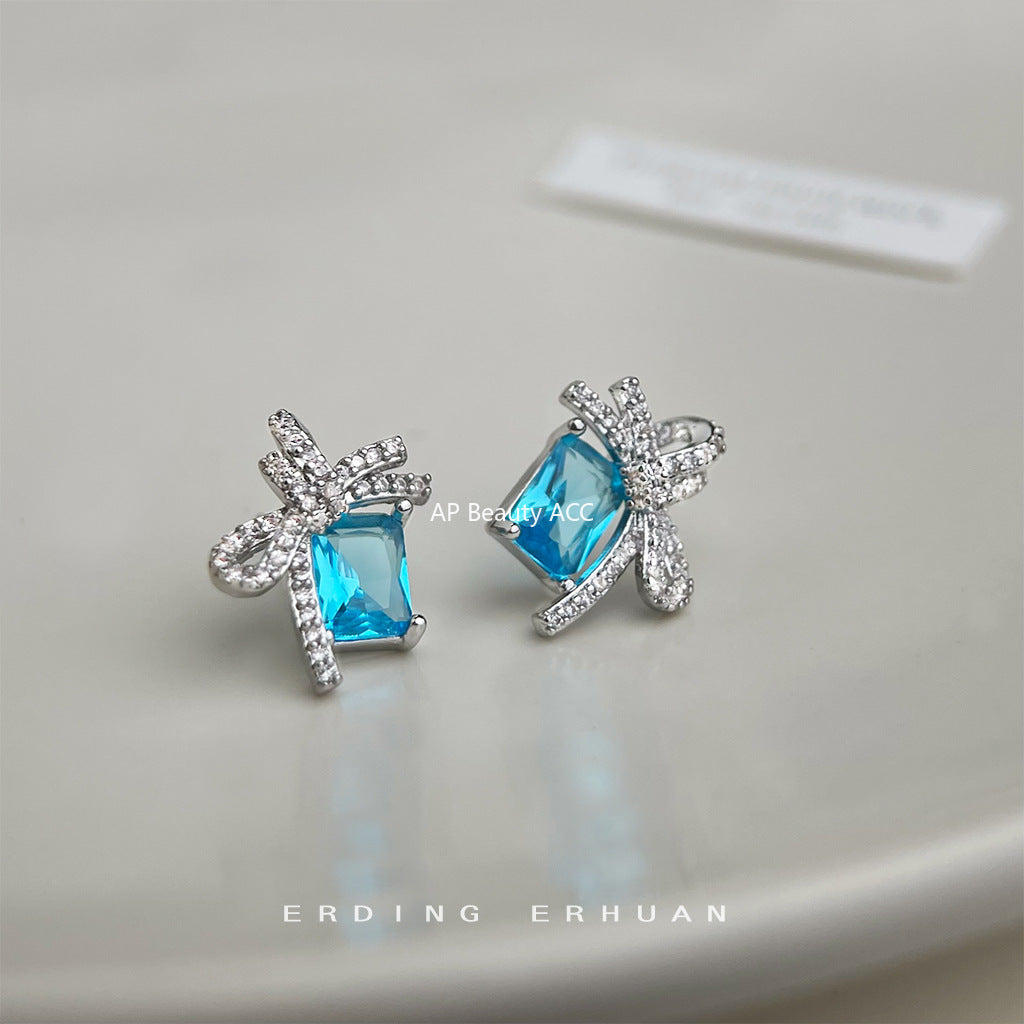 C관 - 아쿠아마린 컬러 큐빅 리본 925 은침 귀걸이 [5767] 25.04-1