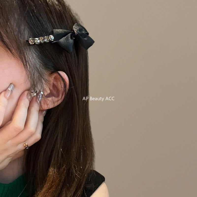 E관 - 리본 디자인 큐빅 장식 헤어핀 [26037E] 25.11-2