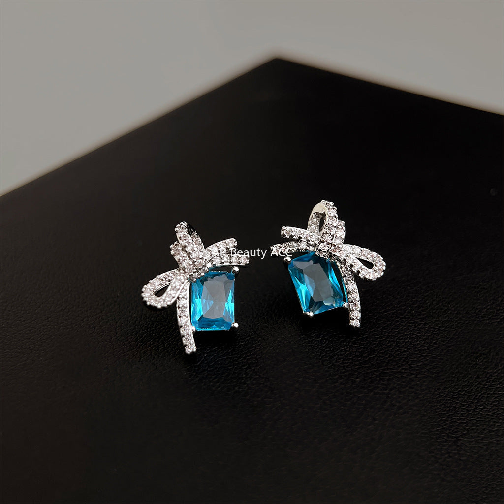 C관 - 아쿠아마린 컬러 큐빅 리본 925 은침 귀걸이 [5767] 25.04-1