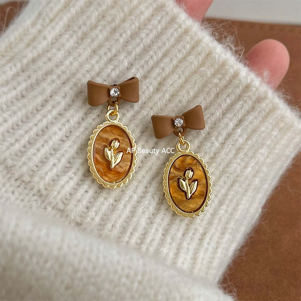 C관 - 925 은침 브라운 에나멜 리본 큐빅 귀걸이 [7024] 25.11-1