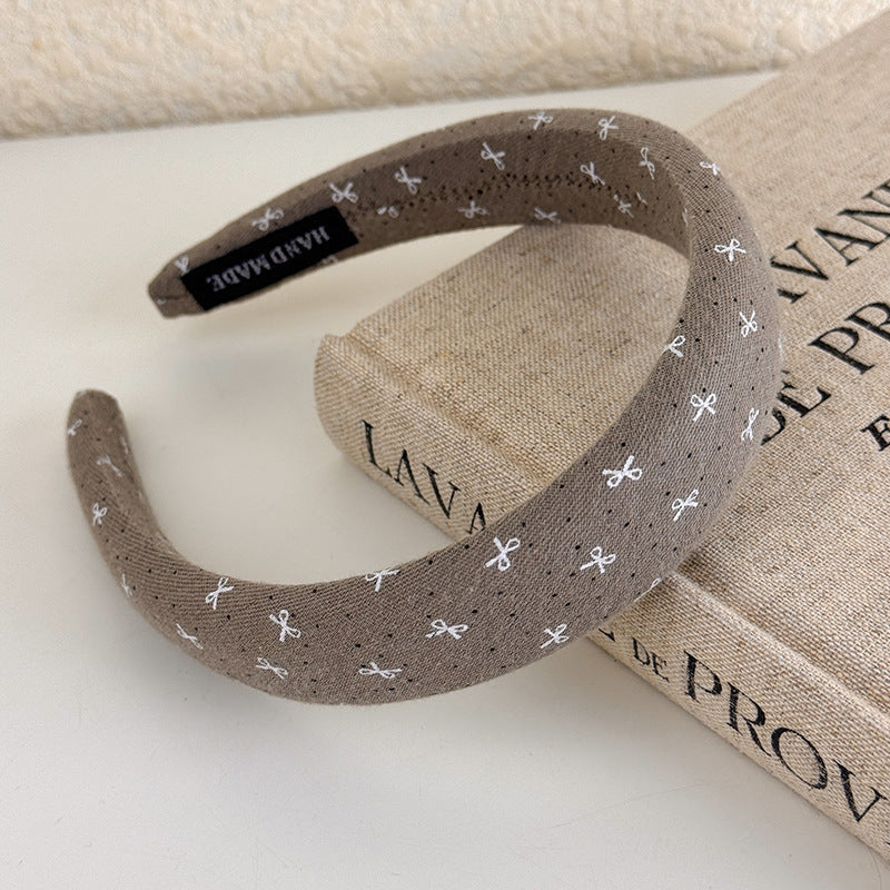 E관 - 브라운 도트 패브릭 스펀지 머리띠 [27498] 25.09-4