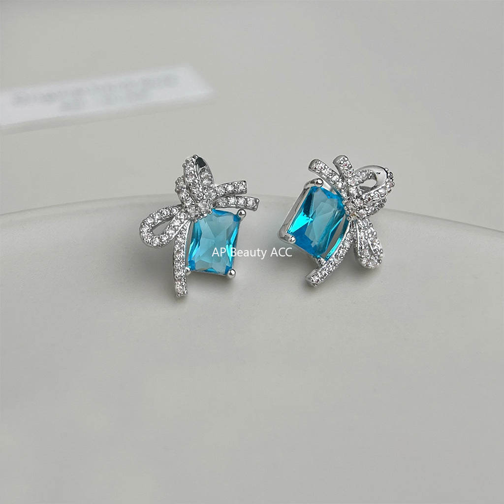 C관 - 아쿠아마린 컬러 큐빅 리본 925 은침 귀걸이 [5767] 25.04-1