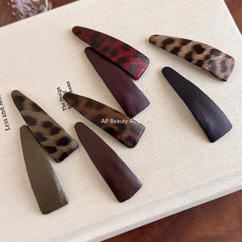 E관 - 호피 가죽 삼각형 헤어핀 [27489] 25.09-4