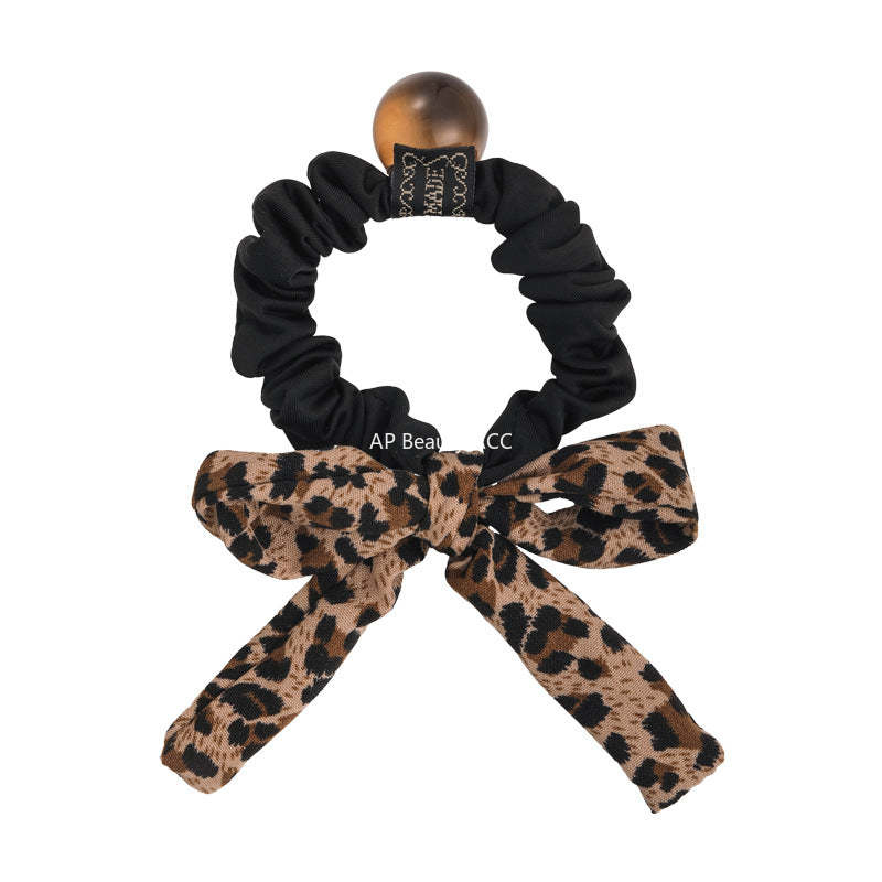E관 - 호피 패브릭 리본 곱창 헤어밴드 [27487] 25.09-4