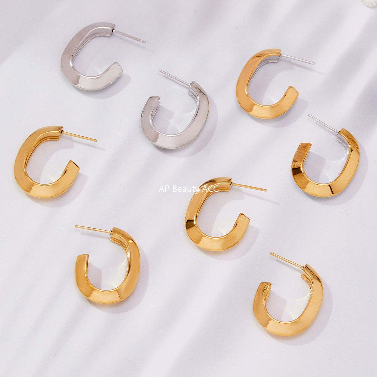 D관 - 스테인리스 18K 도금 삼각 곡면 디자인 귀걸이 [F623] 25.10-5