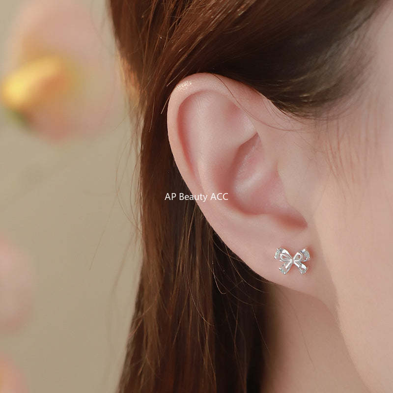 B관 - 925 실버 리본 모양 큐빅 귀걸이 [YC4264E_1] 25.09-4