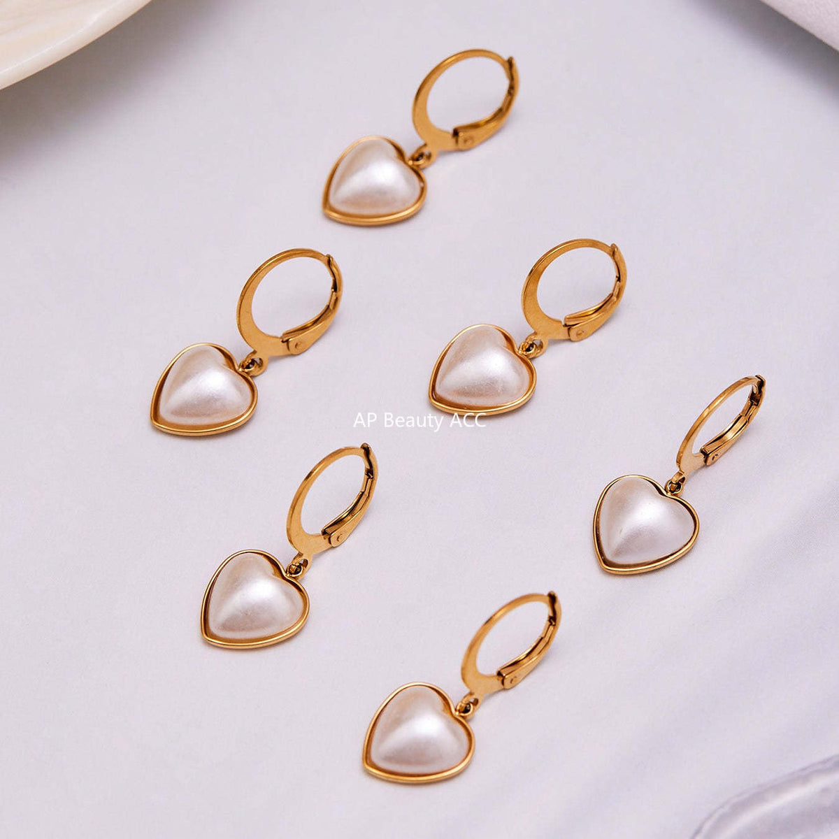 D관 - 스테인리스 18K 도금 자개진주 하트 귀걸이 [F017] 25.10-5
