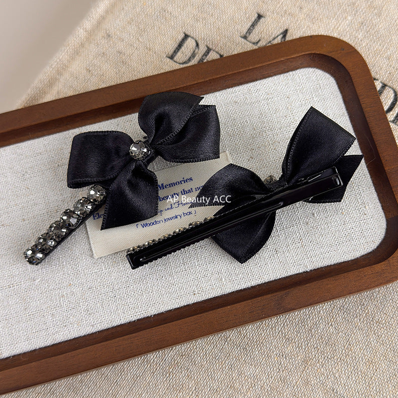 E관 - 리본 디자인 큐빅 장식 헤어핀 [26037E] 25.11-2