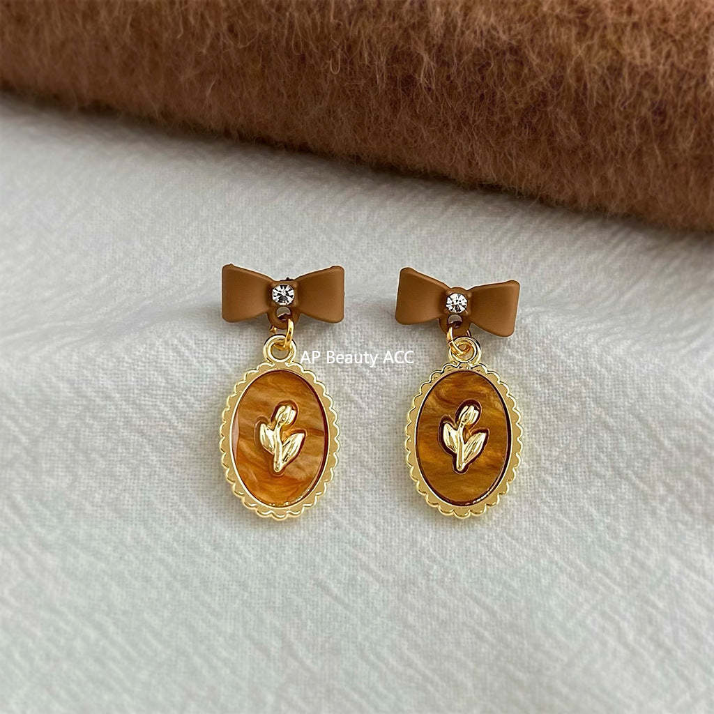 C관 - 925 은침 브라운 에나멜 리본 큐빅 귀걸이 [7024] 25.11-1