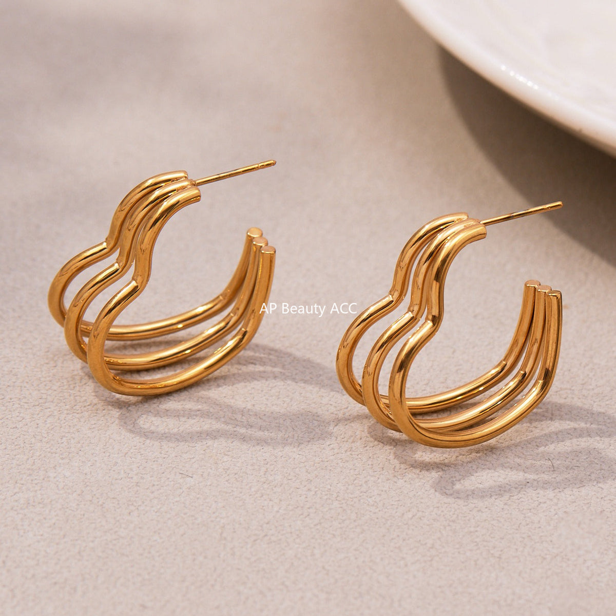 D관 - 스테인리스 18K 도금 레이어 하트 트위스트 귀걸이 [F753] 25.11-1